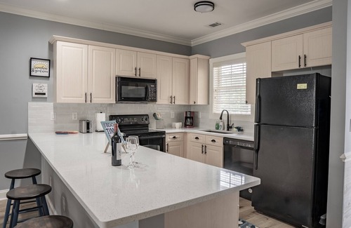 Central Myrtle Beach Condo | Brand new amazing family/golfer retreat with lake & pool view & Elevator