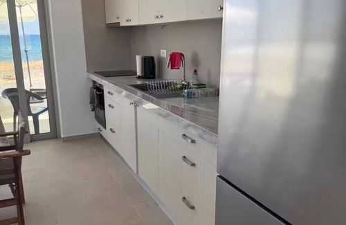 Makry Gialos House | Brand new beachfront house in Koutsouras — 30 steps to crystal-clear water!