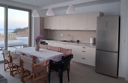 Makry Gialos House | Brand new beachfront house in Koutsouras — 30 steps to crystal-clear water!