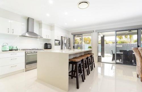 Bongaree House | Bribie Breeze Family Retreat with Pool & BBQ