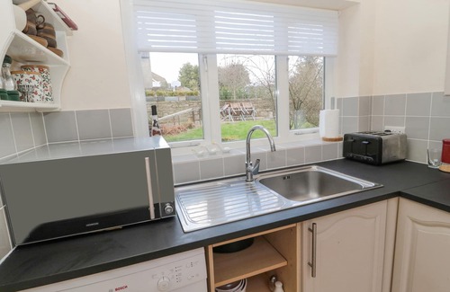 Thropton Cottage | BRIDGE END COTTAGE, pet friendly, with a garden in Rothbury