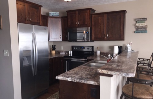 Arnolds Park Cabin | Bridges Bay Cabin and a Boat Hoist Available!