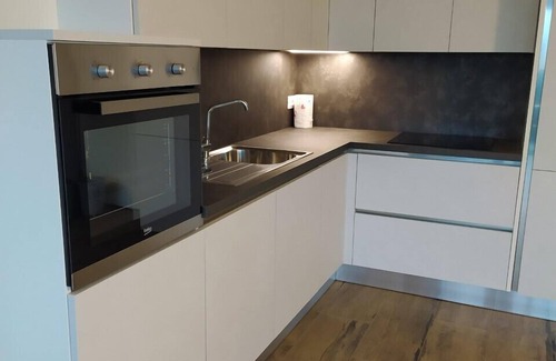 Riva del Garda Apartment | Bright apartment, near the lake, large terrace with view, a/c, garage