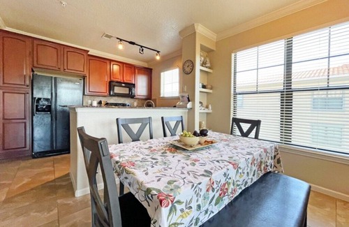 Regal Palms Condo | Bright condo with south facing balcony overlooking pond