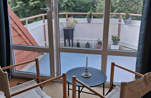 Travemuende Apartment | Bright, cozy 1-room apartment with spacious eat-in kitchen and balcony with evening sun
