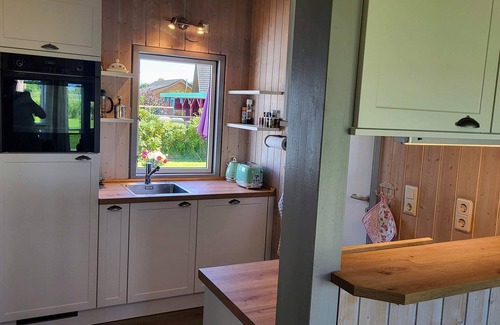Kating House | bright Danish timber house with open views to nature, pets welcome