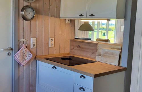 Kating House | bright Danish timber house with open views to nature, pets welcome