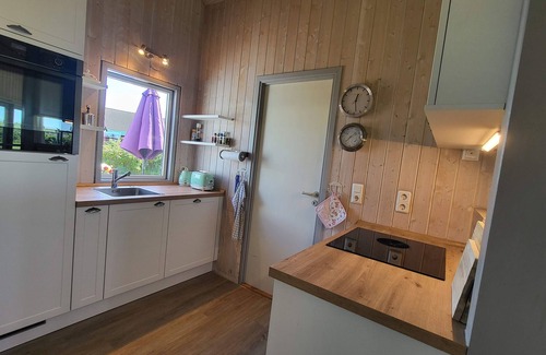 Kating House | bright Danish timber house with open views to nature, pets welcome