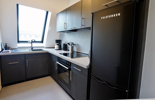 Mitte Apartment | bright designer apartment with large balcony, next to Mauerpark & Berlin Wall