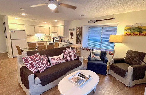 Port St. Joe House | Bright end unit across from pool -steps to beach ramp -beach chairs & cart incl.