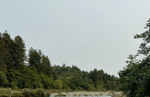 Crescent City House | Bright, open concept, family friendly house, private sandy beach on the river