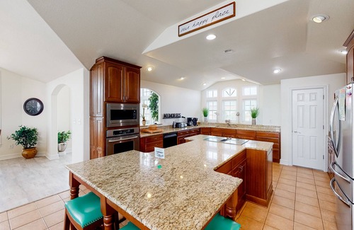 Sandbridge House | Bright & open waterfront home with private pool, sunset views, decks & elevator