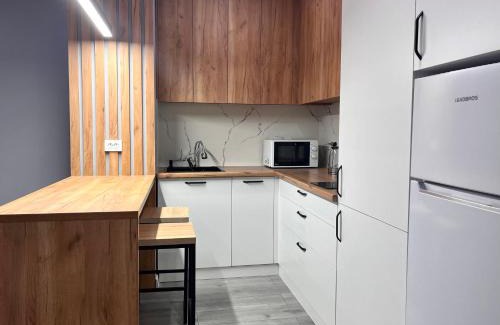 Almaty Apartment | Bright Raimbek19-21 Residence 1br, next to metro & drinking water as a gift