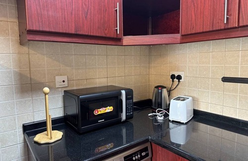 Discovery Gardens Condo | Bright renovated 1 Bedroom Next to Metro Mallnn
