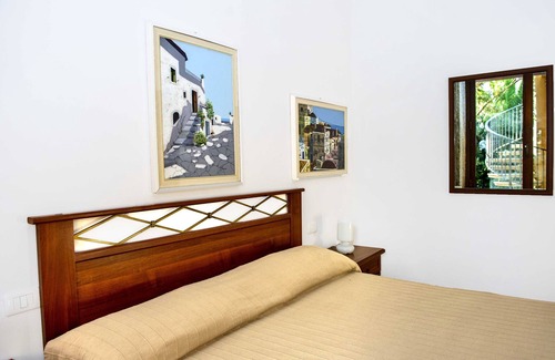 Le Rocchette Apartment | brown apartment by the sea with private beach and private parking