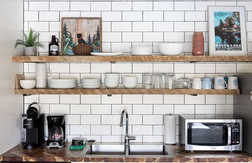 Lake Ann House | Bryan Lake Oasis in Downtown Lake Ann | Firepit | Beach