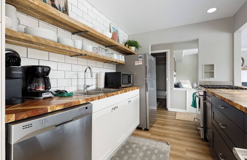 Lake Ann House | Bryan Lake Oasis in Downtown Lake Ann | Firepit | Beach