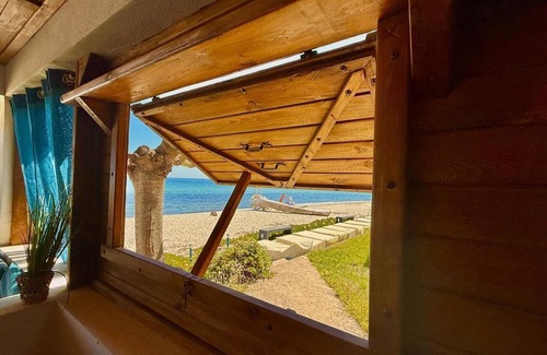 Ghisonaccia Villa | Bungalow 59 - Mini Villa on the beach "feet in the water