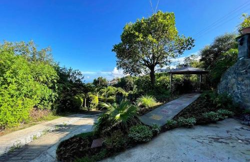 Trois-Bassins House | Bungalow charmant à Les Trois Bassins avec vue sur mer