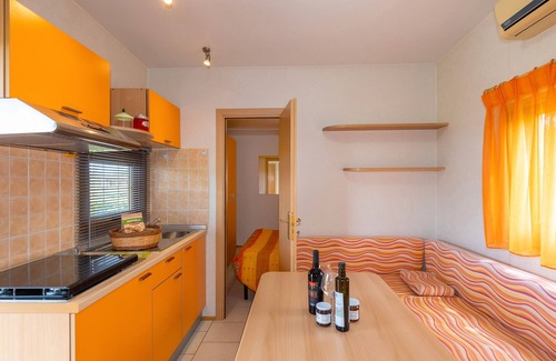 Bibbona House | Bungalow 'Stella 1' with Shared Pool, Private Terrace and Air Conditioning