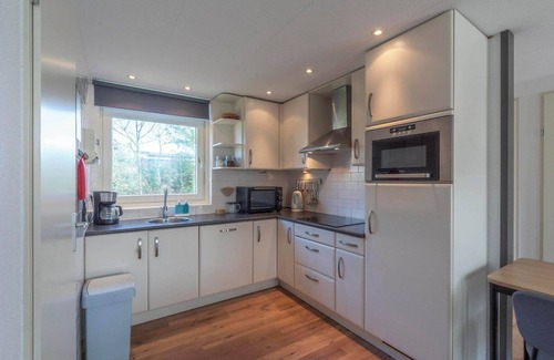 Sint Maartensvlotbrug House | Bungalow with Sauna and Pool in Quiet Location
