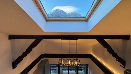 Busteni Apartment | Busteni Mountain View Suites by the River - EV Plug