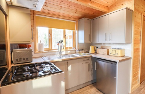 Theberton Cottage | BUTTERCUP LODGE, pet friendly, with a garden in Leiston