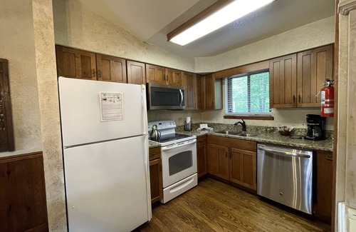 Mount Ida Cottage | C8, Two bedroom, two bath log-sided, lake view luxury cottage with hot tub by RedAwning