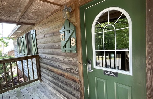 Mount Ida Cottage | C8, Two bedroom, two bath log-sided, lake view luxury cottage with hot tub by RedAwning