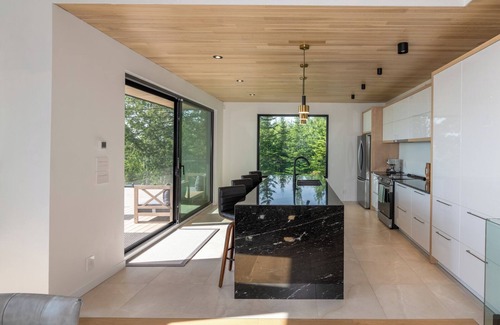 Petite-Riviere-Saint-Francois Ski Chalet | Altéa Charlevoix - luxury villa: spa, pool, billiards, view