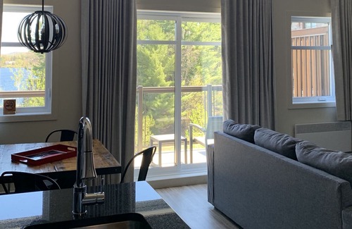 Sainte-Marguerite-du-Lac-Masson Condo | Top floor 2 bedroom Condo with Lake View