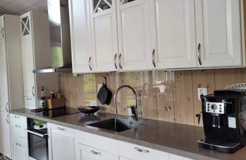 Verdal Cabin | Cabin by the water – Jacuzzi & electric bicycles included