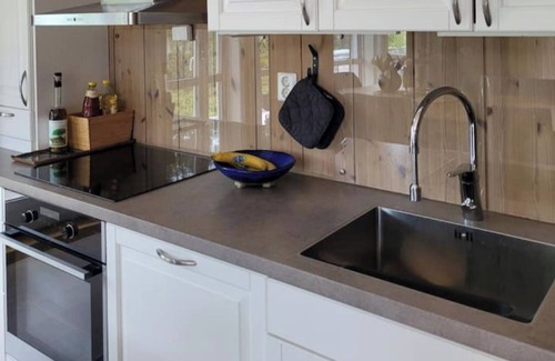 Verdal Cabin | Cabin by the water – Jacuzzi & electric bicycles included