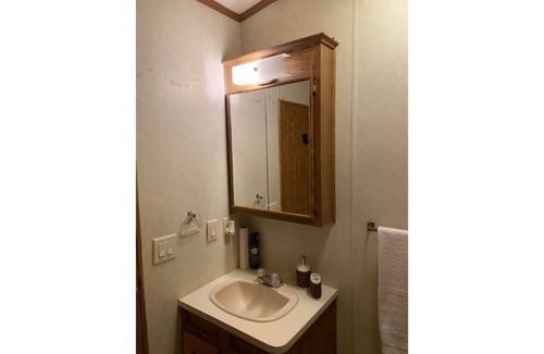 Milford RV Rental | Cabin in the woods, home away from home.