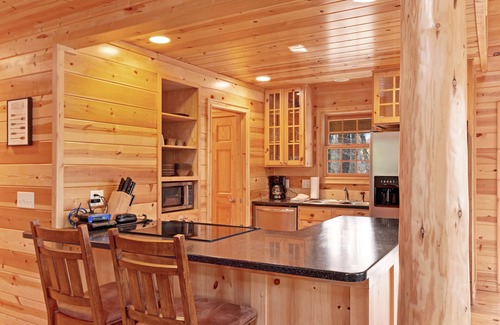 Saugatuck Cabin | Cabin tucked in the trees with private hot tub & lake/pool access