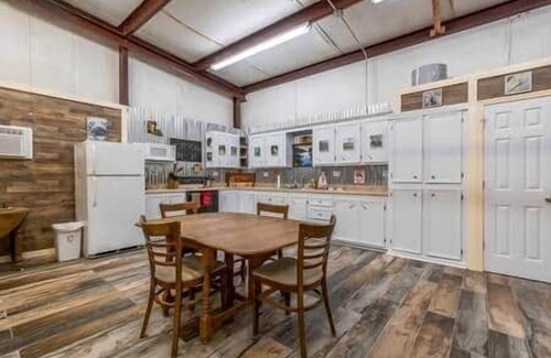 Butte La Rose House | Cajun rustic industrial studio style