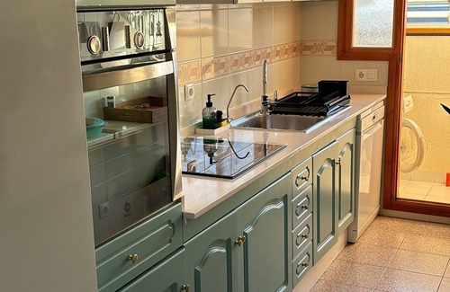Calafell Apartment | Calafell Beachfront Escape. Spacious Attic with Rooftop Terrace and Pool.
