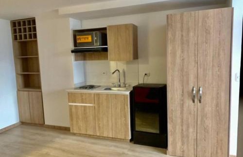 Manizales Apartment | Cama Queen, Vista a las Montañas