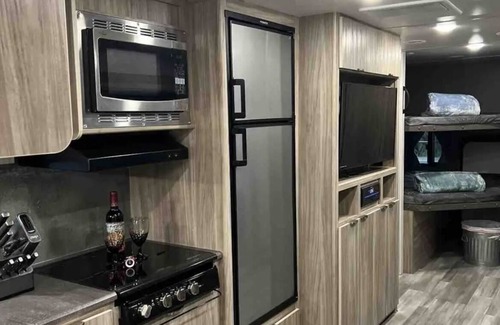 Ochlockonee Bay House | Camper with bunk beds on Ochlockonee Bay! Pet friendly