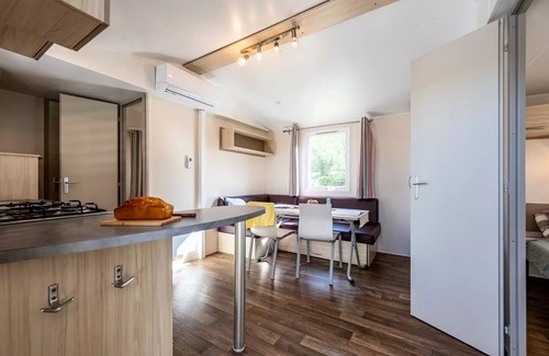 Badefols-sur-Dordogne House | Camping Les Bö-Bains * * - 2 bedroom mobile home on the banks of the river and air-conditioned Sunday/Sunday (29 m²) n°0 to 2 6 people