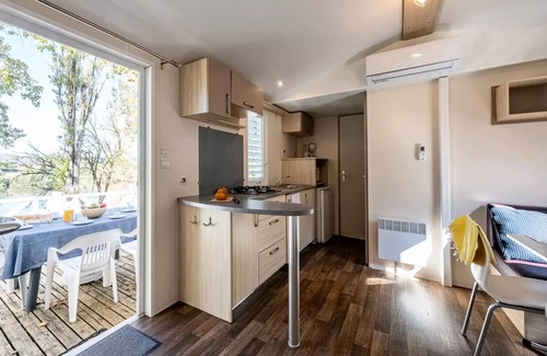 Badefols-sur-Dordogne House | Camping Les Bö-Bains * * - 2 bedroom mobile home on the banks of the river and air-conditioned Sunday/Sunday (29 m²) n°0 to 2 6 people