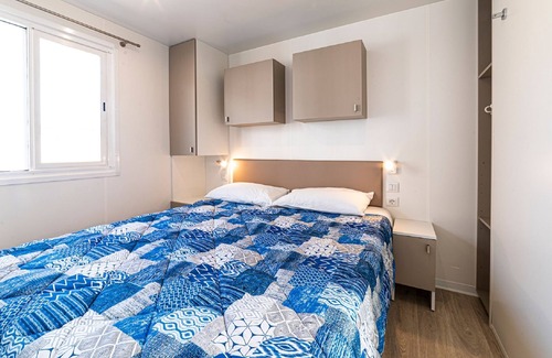Fertilia House | Camping Village Laguna Blu 4* by Interhome