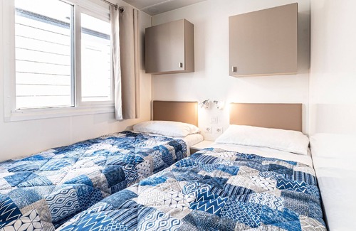 Fertilia House | Camping Village Laguna Blu 4* by Interhome