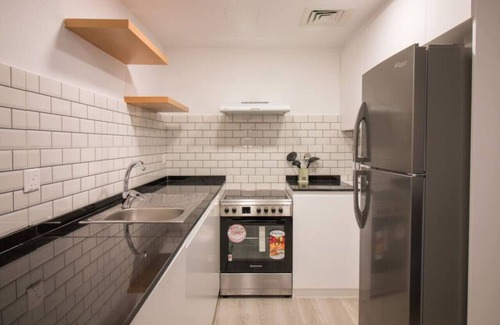 Jumeirah Lake Towers Apartment | Canal-Side Charm: Studio living at Dubai Arch