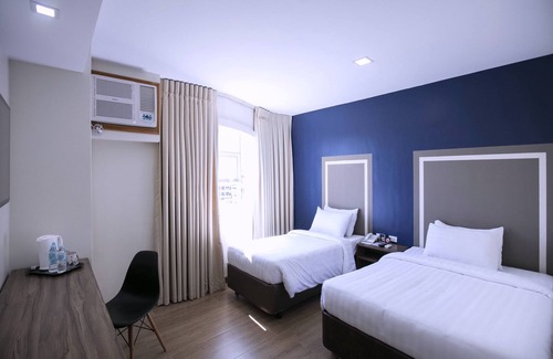 Guadalupe Hotel | Capital O 911 S Hotel And Residences