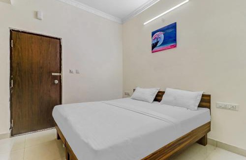 Bengaluru Hotel | Capital O Safari Rooms Near Snow City