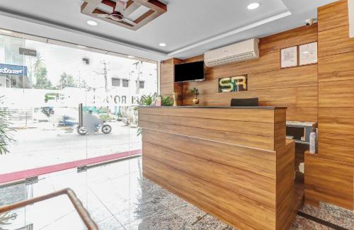 Bengaluru Hotel | Capital O Safari Rooms Near Snow City