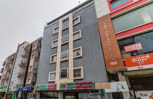 Bengaluru Hotel | Capital O Safari Rooms Near Snow City