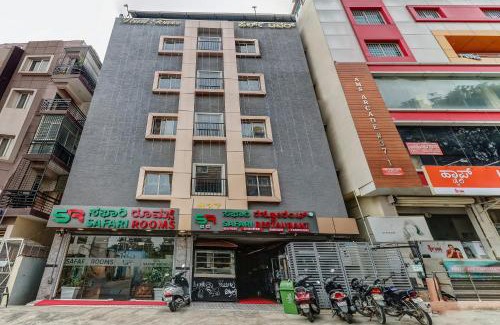 Bengaluru Hotel | Capital O Safari Rooms Near Snow City