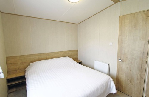 Alford House | Caravan with one double and one twin.